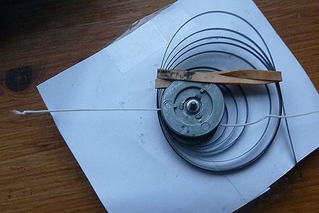 Note how the cord fits in the record pulley