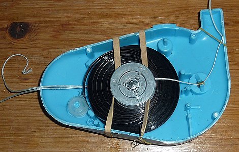 The record assembly held tightly in place