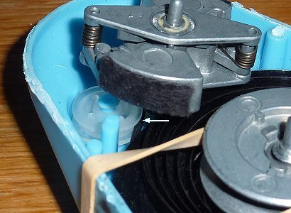 Drive belt does NOT go around little white pulley